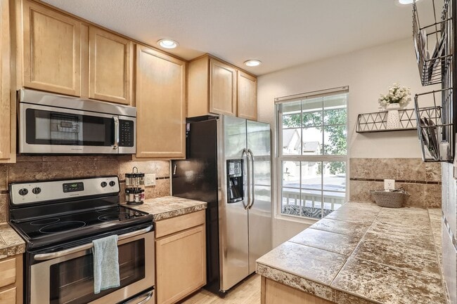 Photo - Evolve Real Estate: Spacious 3 Bed 3 bath Townhouse  in LITTLETON! Available 7/5/2026!