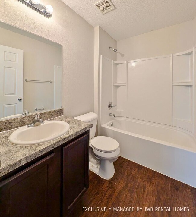 Building Photo - 8407 McGirts Village Ln