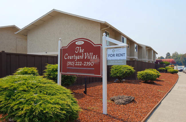 Building Photo - Courtyard Villa Apartments