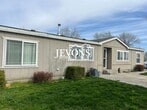 Primary Photo - 4-bedroom single-family home with 1 fenced...