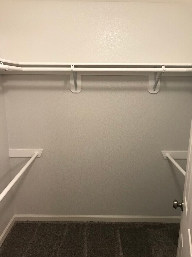 Walk-in master bedroom closet - 6975 Rodling Dr