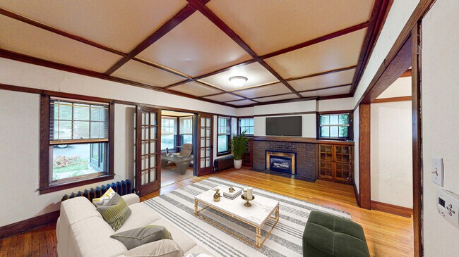 Sala de estar decorada - The Badger Den Apartments on Kendall