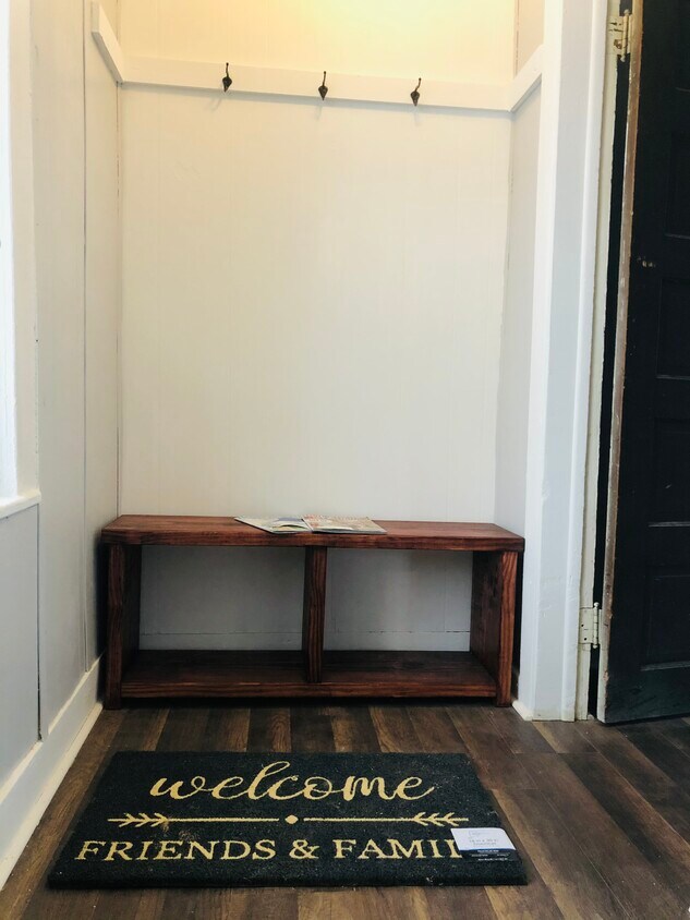 Top of stairs and front entry - 479 W Muskegon Ave