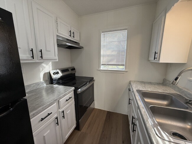 Foto del edificio - Bright, Efficient Apartment with Section 8 Acceptance