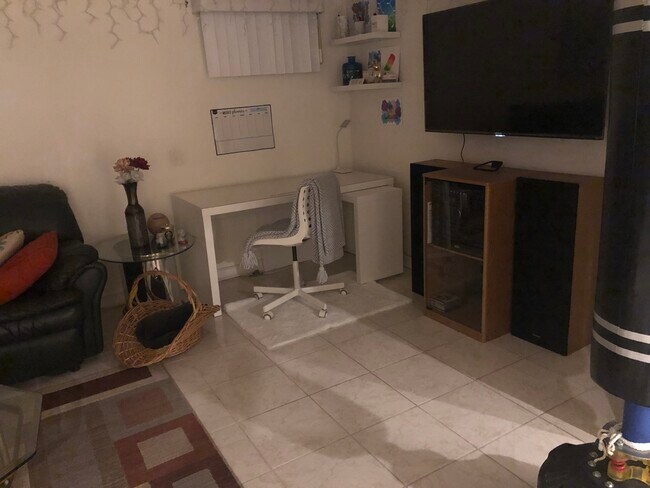 Study table with chair, TV - 11735 132nd St