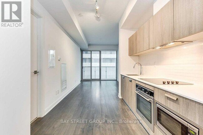 Photo du bâtiment - 50 Charles St E