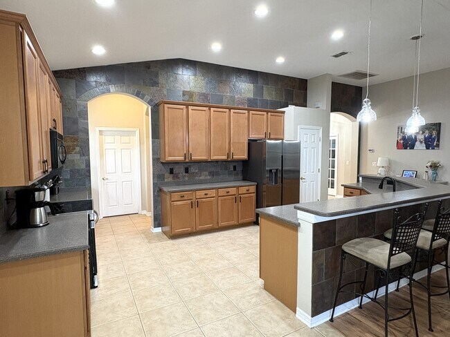 Kitchen with Stainless Steel Appliances - 12426 23rd St E