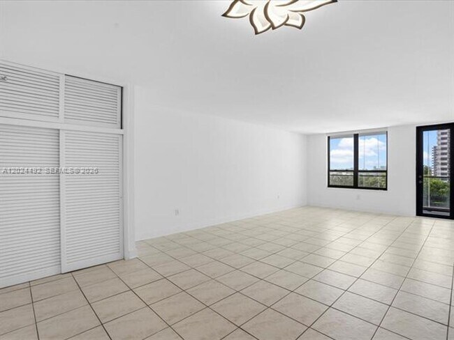 Building Photo - 10185 Collins Ave