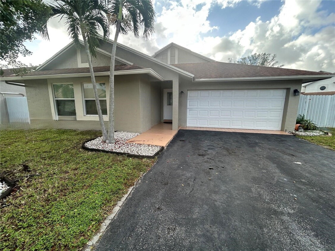 Photo - 18730 Northwest 77th Court, Hialeah, FL 33015 - 4 BR 2 BA Single-Family Home