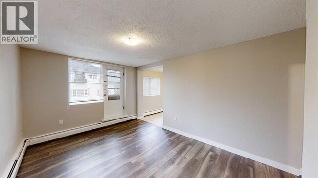 Building Photo - 9932-9105 105 Ave