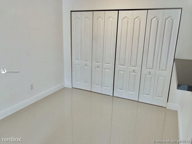 Building Photo - 3 br, 2 bath Condo - 8303 SW 142nd Ave # D111
