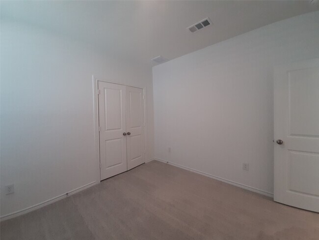 Foto del edificio - 16026 Tangled Vine Ln
