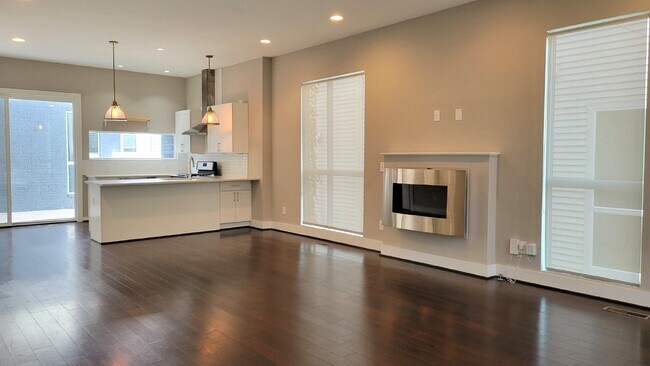 Building Photo - 3 Story home with 3 separate outdoor livin...