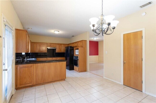 Building Photo - Four bedroom home in a nice location. Well...