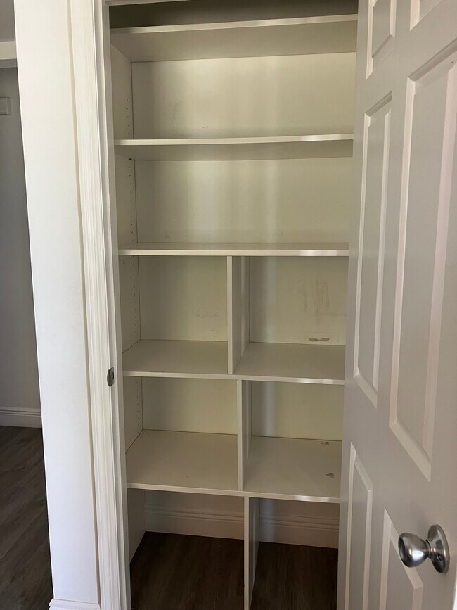 Wood shelving to help organize your pantry! - 3231 SW 1st Pl