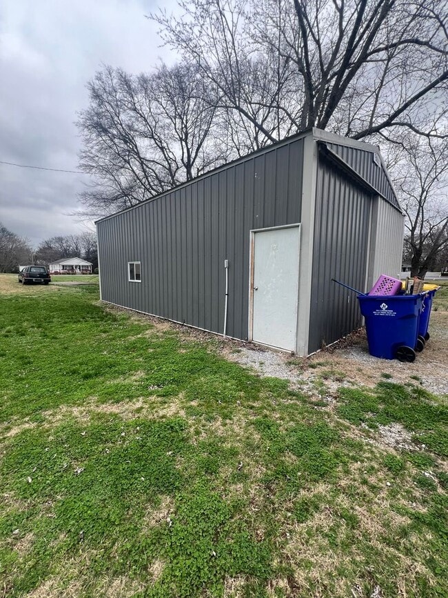 Building Photo - Three bedroom home with XL garage!