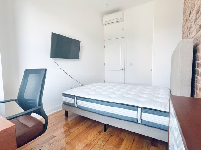 Photo - Central AC, washer/dryer, Exposed Brick Room #214 Apartment