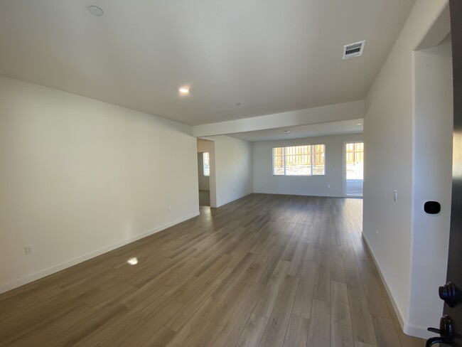 Living room / Dining Room - 9895 Churchill Downs Dr