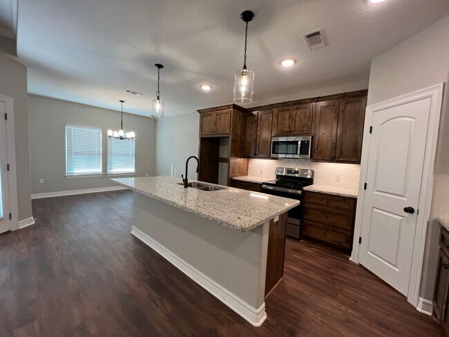 Building Photo - Immaculate 3/2/2 new construction in Angle...