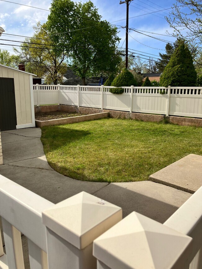 Fenced backyard with garden plot - 2158 S 1800 E