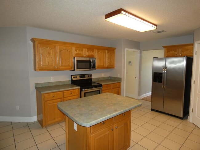 Building Photo - Charming 4-Bedroom Home With Sunroom