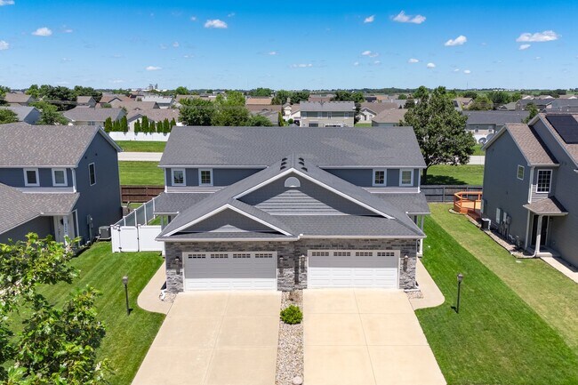 Building Photo - Spacious 4-Bedroom, 3.5-Bathroom Townhome & 2-Car Garage-West Champaign