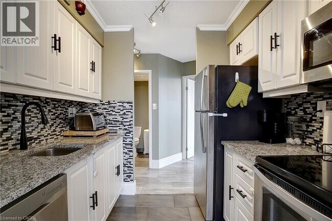 Building Photo - 3227 King St E