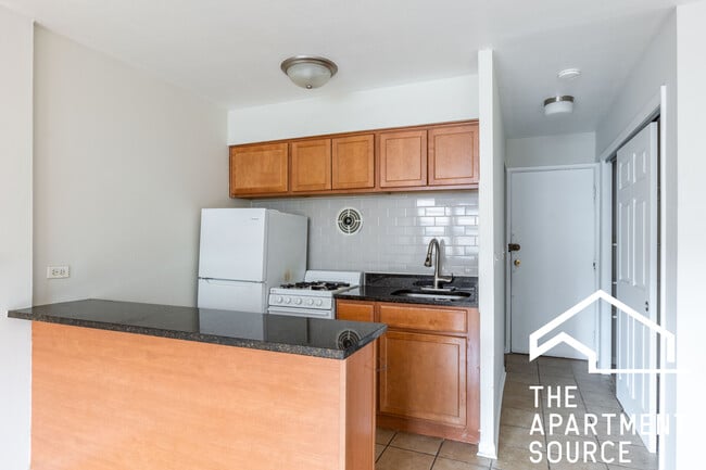 Foto del edificio - 5847 N Winthrop Ave