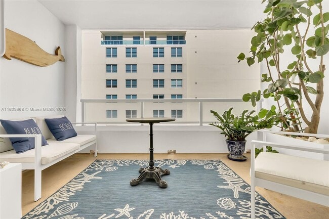 Building Photo - 5005 Collins Ave