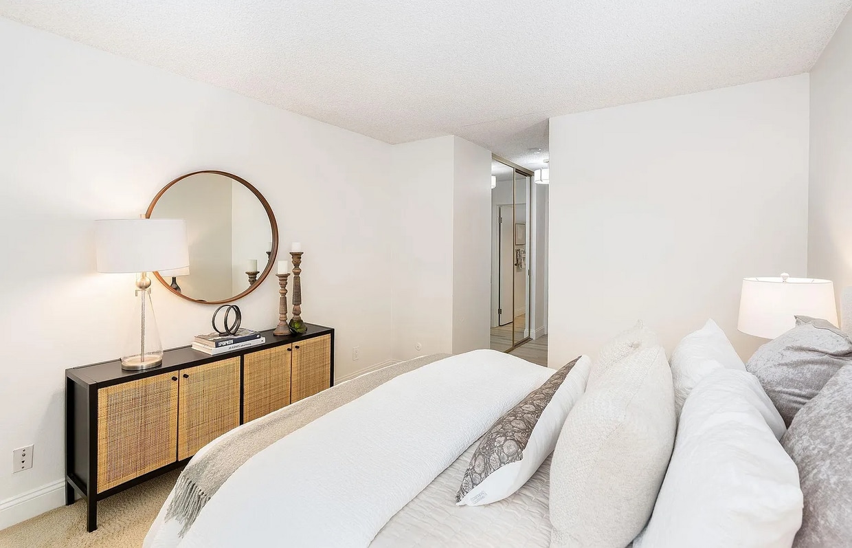 Primary Photo - The updated bathroom offers a shower-over-...