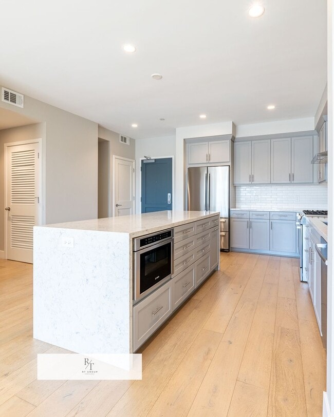 Building Photo - Quiet, Modern 2-Bed Home with Private Pati...