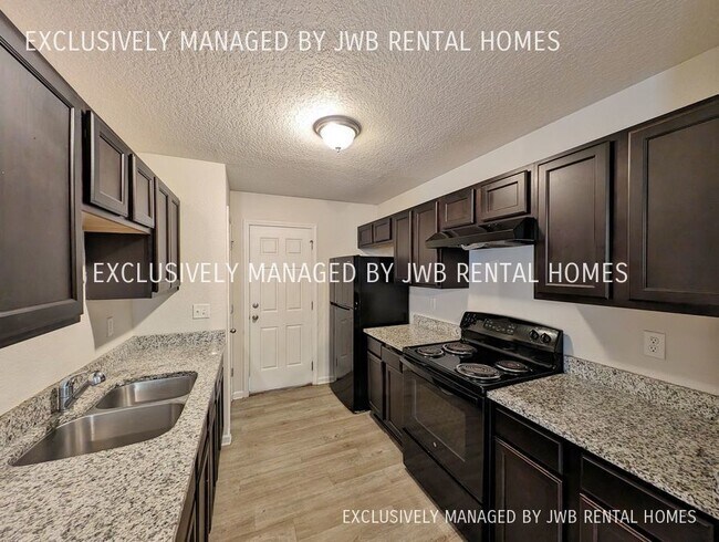 Foto del edificio - 6133 Strawflower Pl