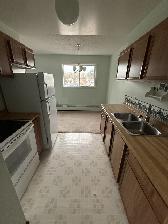 Photo du bâtiment - 301-911-310 10 St