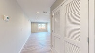Located at 829 Carthage Hwy in Lebanon, TN, this well-appointed single-floor home offers a thoughtfully designed layout that maximizes every square foot. Light wood-look flooring flows throughout the entire space, creating a cohesive, airy feel that ties each room together seamlessly.

The open-concept kitchen and living area serves as the heart of the home. The kitchen is outfitted with crisp white shaker-style cabinetry, granite countertops, stainless steel appliances including a range, microwave, and dishwasher, and a stainless undermount sink — all accented with matte black hardware for a contemporary touch. Recessed lighting illuminates the living area, which features a large window that invites natural light and outdoor views.

The bedroom is a comfortable retreat with a ceiling fan, a generously sized window overlooking greenery, and direct access to a dedicated walk-in closet equipped with wire shelving for organized storage. Louvered bifold doors add a classic detail to the closet entry.

The full bathroom maintains the same refined aesthetic, featuring a white vanity with granite countertop, a soaking tub and shower combination with built-in shelving, and brushed nickel fixtures throughout. Clean neutral wall tones across the entire home contribute to a bright, move-in-ready atmosphere.