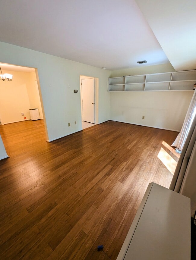 Living room also includes a built-in bookshelf - 4 Chelsea Cir