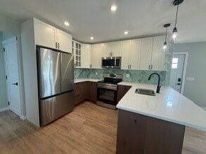 Building Photo - 5112-5152 52 Ave
