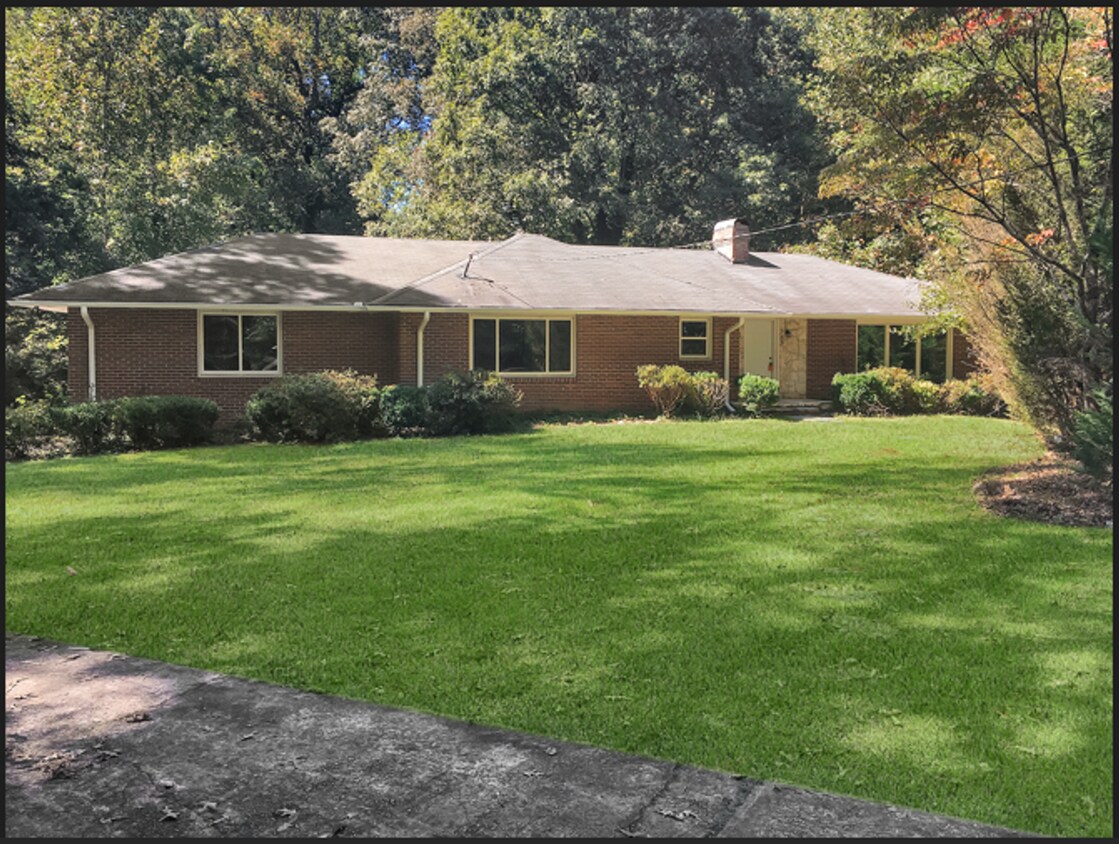 Primary Photo - Stunning 3-Bed, 2-Bath Brick Home with Gar...