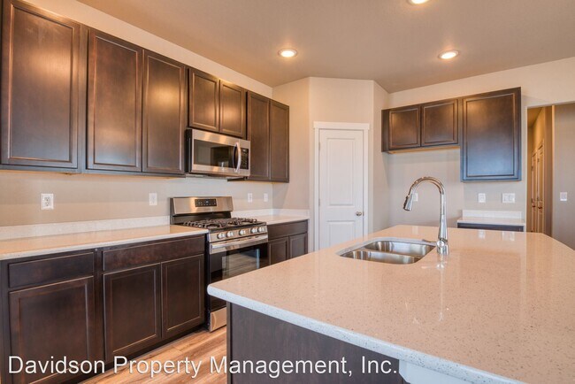 Building Photo - 4 br, 3.5 bath House - 7782 Sun Shimmer View