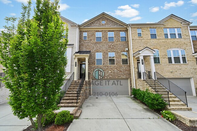 Foto del edificio - A beautifully maintained 3-bedroom, 3.5-ba...
