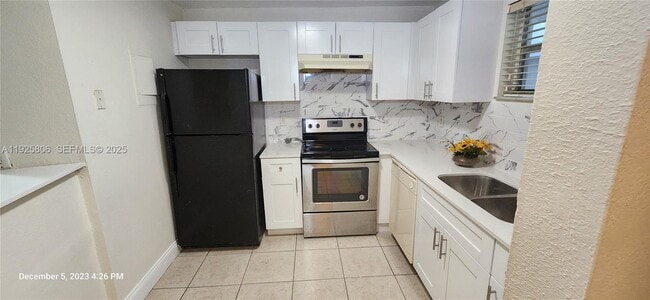 Building Photo - 4235 N University Dr