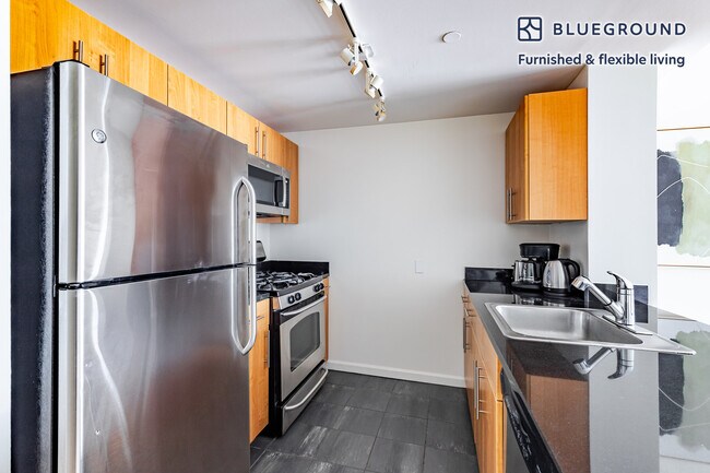 Building Photo - 4-75-75 48th Ave