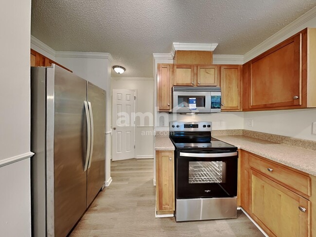 Foto del edificio - 1302 River Rock Dr