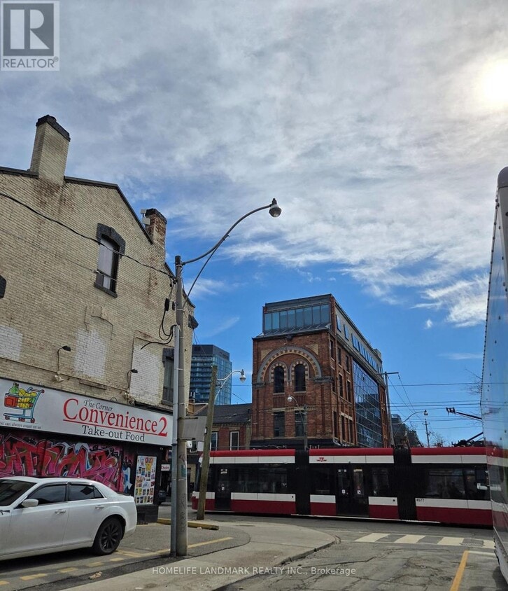 Building Photo - 310 Queen St E