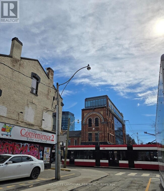 Building Photo - 310 Queen St E