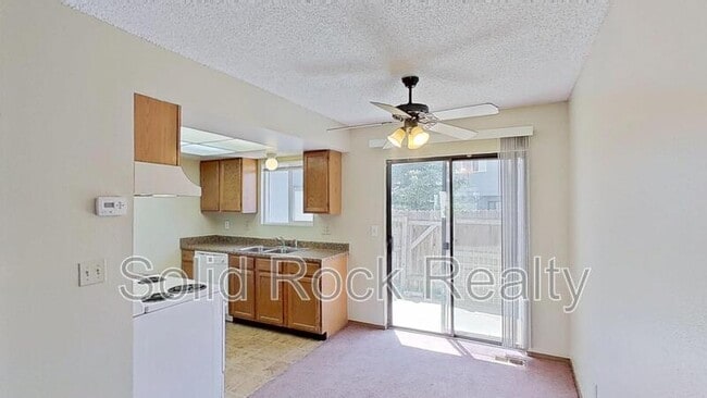 Photo - 6677 Proud Eagle Ct Townhome