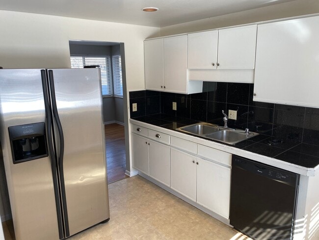 Building Photo - BRICK RANCH, FINISHED BASEMENT, CORNER LOT...