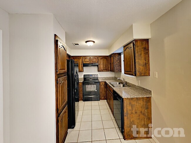 Foto del edificio - 5708 Woodsetter Ct