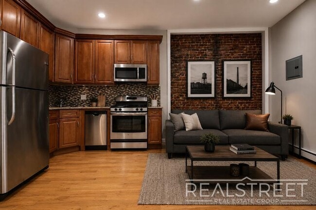 Building Photo - Renovated 3 BR with W/D! in Bed Stuy Townhouse