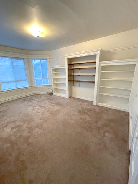 Built-in shelving in main living area - 1017 Hyde St