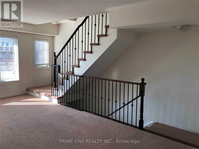 Building Photo - 5605 Oscar Peterson Blvd